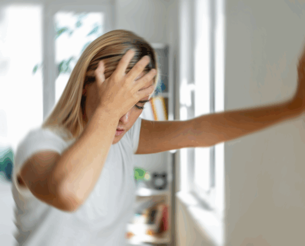 dizzy person going to physiotherapy in surrey